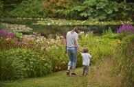Exploring by the lake in Summer at RHS Rosemoor