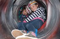 Children in a tunnel at Haven Banks