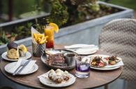 Relaxed dining by the river at Cave