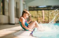 Child splashing in Cofton Pool