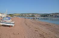 Shaldon Beach with boats on it