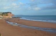 Teignmouth Beach with cliffs in the background