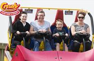 Adults and children on the twister ride