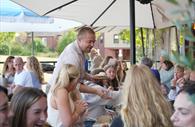 Dine alfresco beside the river