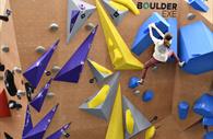 Young climber on the Titan Comp Wall