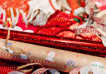 Red and white wrapping paper with ribbons