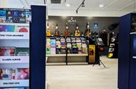 Vinyl records are stocked along with a range of musical instruments.