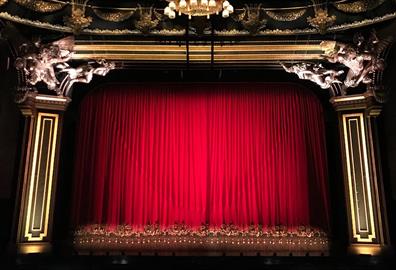 Red curtain at a performance theatre