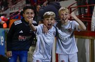 Young Exeter City fans celebrating