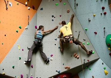 Two people climbing in Quay Climbing Centre