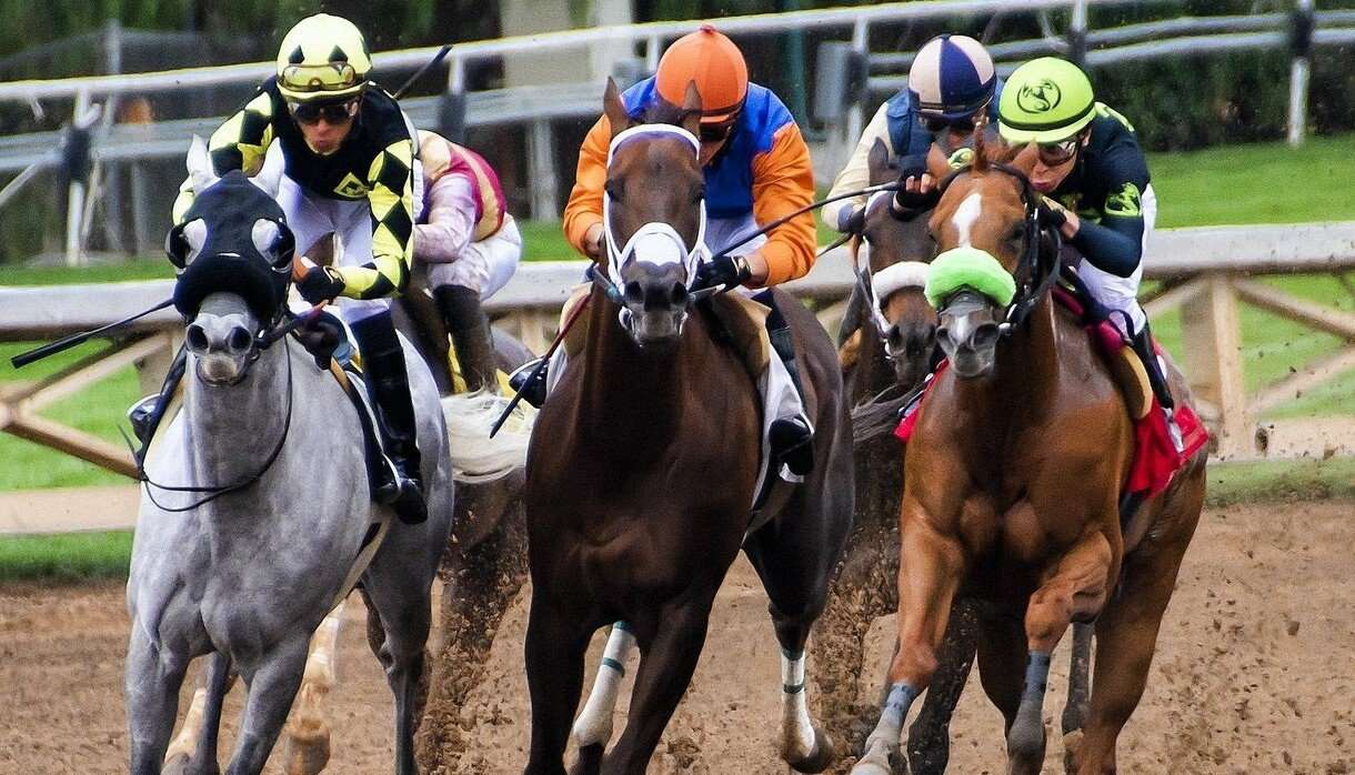 People racing horses