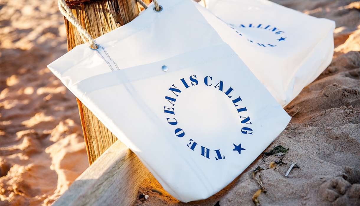 Sails and Canvas bag on the beach