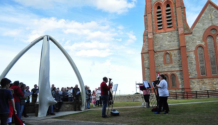 Christmas Carols under the Whalebone Arch
