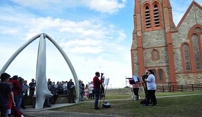 Christmas Carols under the Whalebone Arch
