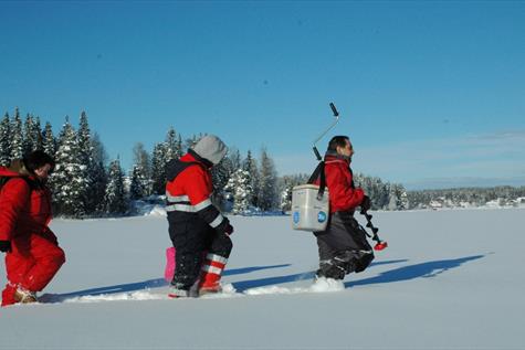 Ice fishing near Sveastranda
