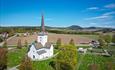 Dronebilde av Ringsaker kirke. Foto: Ringsaker kommune