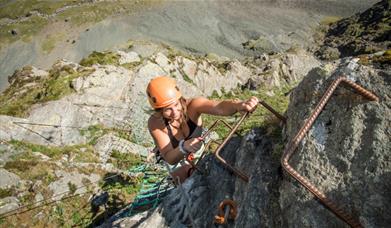 Climber at Via Ferrata Xtreme at Honister Slate Mine in Borrowdale, Lake District