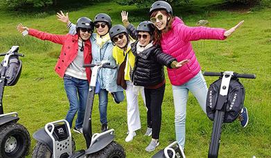 Visitors enjoying an experience with Lakeland Segway in Cartmel, Lake District
