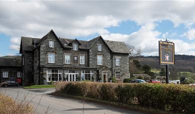 Exterior and signage at The Coniston Inn, Coniston, Lake District