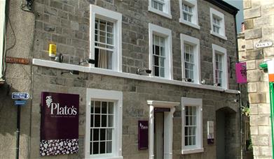Exterior and signage at Plato's in Kirkby Lonsdale, Cumbria