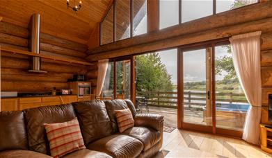 Lounge in Alder Lodge at The Tranquil Otter in Thurstonfield, Cumbria