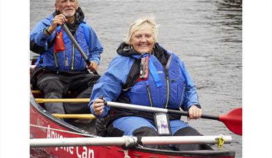 Visitors Canoeing with Anyone Can in the Lake District, Cumbria