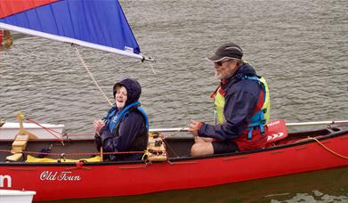 Visitors Canoe Sailing with Anyone Can in the Lake District, Cumbria