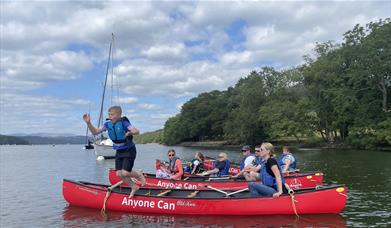 Visitors Canoeing with Anyone Can in the Lake District, Cumbria