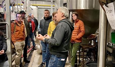 Visitors on a Brewery Tour at Bowness Bay Brewing in Kendal, Cumbria