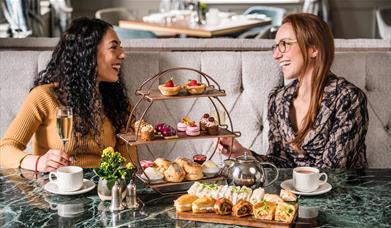 Guests Enjoying Afternoon Tea at The Borrowdale Hotel in Borrowdale, Lake District