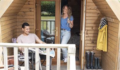 Porch Seating at Camping Pods at Coniston Park Coppice in Coniston, Lake District