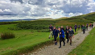 Visitors on a Guided Walk with Genuine Adventures in the Lake District, Cumbria