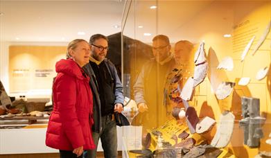 Visitors at the Roman Museum on the Hadrian’s Wall Edge of Empire Tour with Great Guided Tours