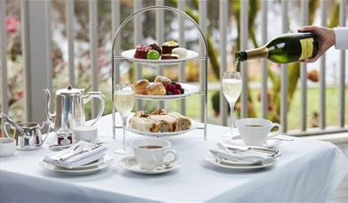 Afternoon Tea Spread with Champagne at Gilpin Lake House in Windermere, Lake District