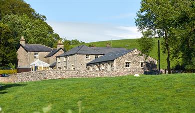 Exterior of Helm Mount Lodge & Cottages in Barrows Green, Cumbria