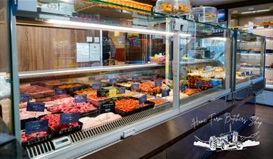 Interior and Display Case at Home Farm Butchers Shop in Aspatria, Cumbria