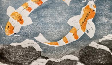 Woodblock  print of two koi fish swimming in a pond
