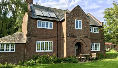 Exterior and Outdoor Seating at Keepers Cottage in Ivegill, Cumbria