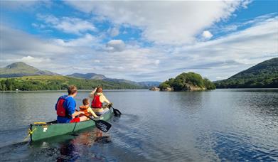 Visitors on a Guided Canoe Trip with Path to Adventure in Coniston, Lake District