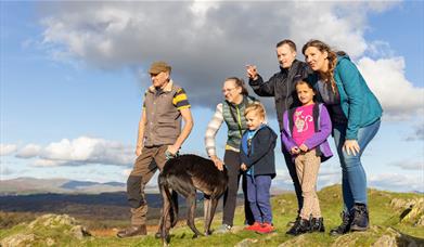 Family on a Scenic Walk near 
Park Cliffe Camping & Caravan Estate in Windermere, Lake District