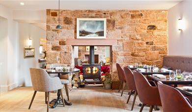 Dining room at the restaurant at Pentonbridge Inn in Penton, Cumbria