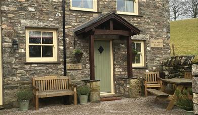 Exterior and Outdoor Seating at Spring Cottage at Helm Mount Lodge & Cottages in Barrows Green, Cumbria