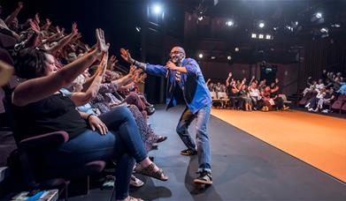 A Performer Interacting with the Audience at Every Brilliant Thing at Theatre by the Lake in Keswick, Lake District