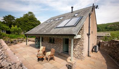 Exterior and patio seating at Ellenboro House in Newton-in-Cartmel, Lake District
