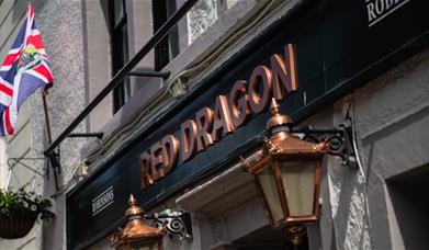 Exterior signage at the Red Dragon Inn in Kirkby Lonsdale, Cumbria
