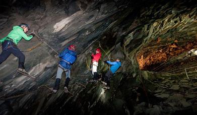 Climb in the Mine at Honister Slate Mine near Borrowdale, Lake District