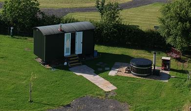 Exterior and Hot Tub at Reiver's Retreat at Low Moor Head Farm in Longtown, Cumbria