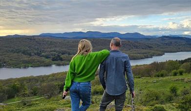 Socially Awkward stood overlooking a lake in Cumbria