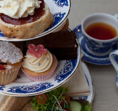 Enjoy afternoon tea at The World of Beatrix Potter in Bowness-on-Windermere, Lake District