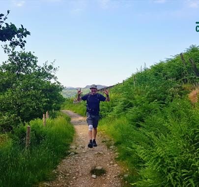 Visitor on a Walking Holiday with Coast to Coast Packhorse in the Lake District, Cumbria